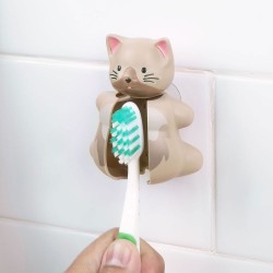 Los portacepillos Flipper de la colección Fun Animals se unen fácilmente a tu espejo o cualquier cristal, con solo un movimiento