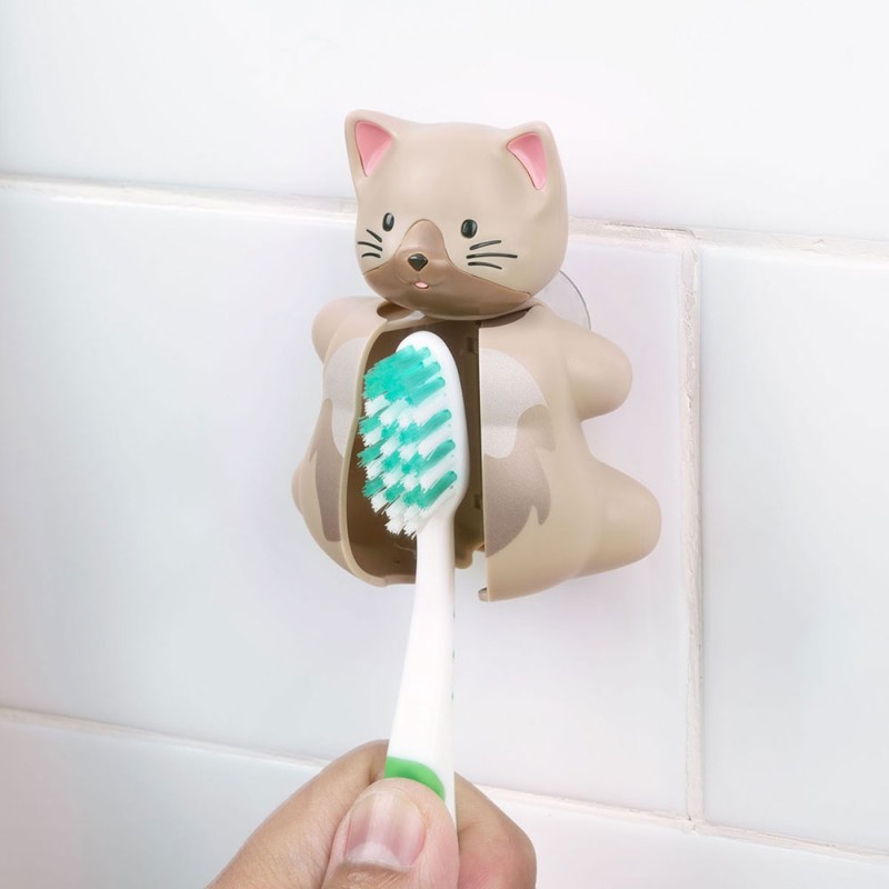 Los portacepillos Flipper de la colección Fun Animals se unen fácilmente a tu espejo o cualquier cristal, con solo un movimiento