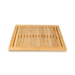 Agrega un toque natural y elegante a tu baño con este tapete de bambú, ideal para mantener tus pies secos y seguros al salir de 