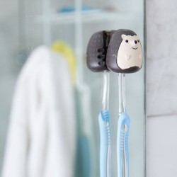 Ventosa con soporte de erizo para guardar el cepillo de dientes, protegiéndolo de gérmenes, polvo etc., una amigable forma de gu