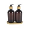 Set de dos dosificadores Kuwait elaborado en plástico color ámbar. Ideal para jabón liquido o en gel, y otro con opción de crema
