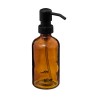 Dosificador de jabón transparente de 250 ml, elaborado en vidrio de alta calidad. Su diseño minimalista y elegante permite visua