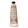Un pequeño envase de crema de manos, fácil de llevar en el bolso o de viaje, para unas manos bonitas e hidratadas en cualquier c