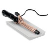 Alfombra de silicona resistente al calor, diseñada para proteger las superficies de sus muebles del daño por planchas de cabello
