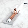 Alfombra de silicona resistente al calor, diseñada para proteger las superficies de sus muebles del daño por planchas de cabello