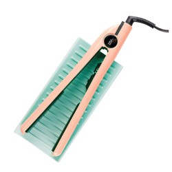 Alfombra de silicona resistente al calor, diseñada para proteger las superficies de sus muebles del daño por planchas de cabello