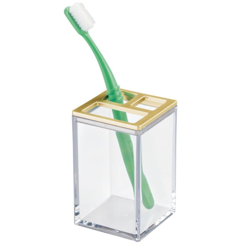 Este soporte para cepillo de dientes presenta dos aberturas pequeñas y una más grande, puede contener hasta cuatro cepillos de d