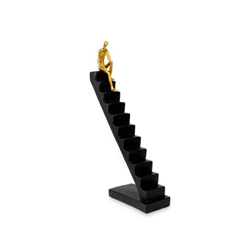 El accesorio decorativo Escalera con Hombre representa el esfuerzo, la superación y el deseo constante de alcanzar nuevas altura