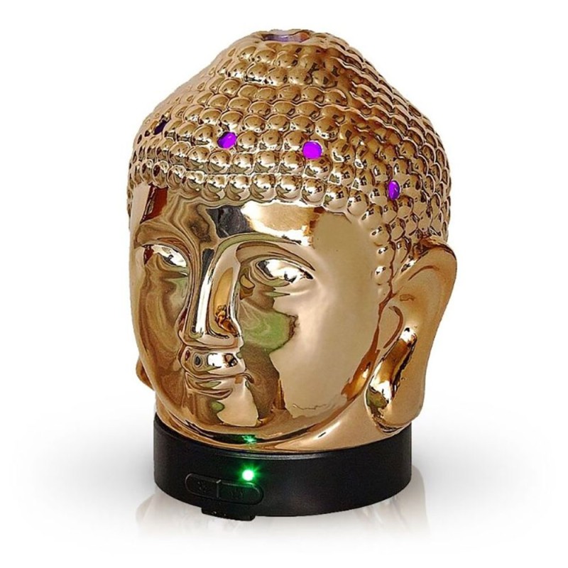 El difusor ultrasónico combina el poder de la aromaterapia con el diseño elegante de una cabeza de Buda en cerámica dorada, idea