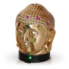 El difusor ultrasónico combina el poder de la aromaterapia con el diseño elegante de una cabeza de Buda en cerámica dorada, idea