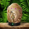 El difusor ultrasónico combina el poder de la aromaterapia con el diseño elegante de una cabeza de Buda en cerámica dorada, idea