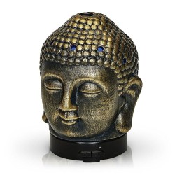 El difusor ultrasónico combina el poder de la aromaterapia con el diseño elegante de una cabeza de Buda en cerámica dorada, idea