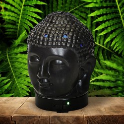 El difusor ultrasónico combina el poder de la aromaterapia con el diseño elegante de una cabeza de Buda en cerámica dorada, idea
