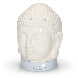 El difusor ultrasónico combina el poder de la aromaterapia con el diseño elegante de una cabeza de Buda en cerámica dorada, idea