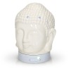 El difusor ultrasónico combina el poder de la aromaterapia con el diseño elegante de una cabeza de Buda en cerámica dorada, idea