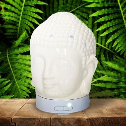 El difusor ultrasónico combina el poder de la aromaterapia con el diseño elegante de una cabeza de Buda en cerámica dorada, idea