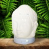 El difusor ultrasónico combina el poder de la aromaterapia con el diseño elegante de una cabeza de Buda en cerámica dorada, idea