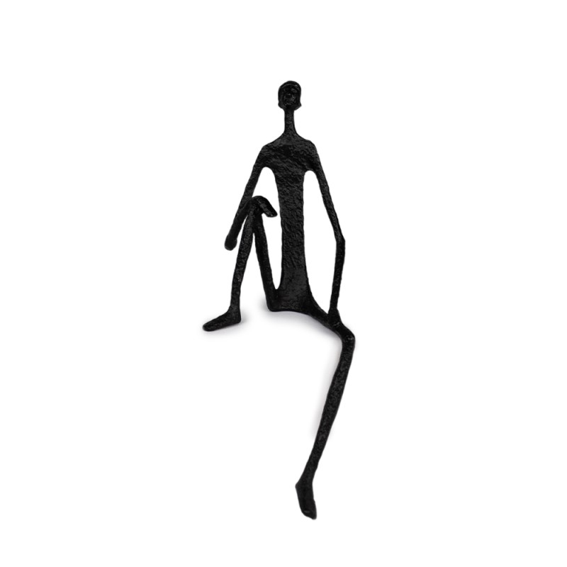 Agrega profundidad y estilo a tu decoración con esta escultura del "Hombre Pensante". Su silueta moderna y minimalista transmite