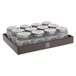 Llena tu espacio de armonía y sofisticación con esta vela aromática de 65g con fragancia a sándalo. Su aroma amaderado y terroso