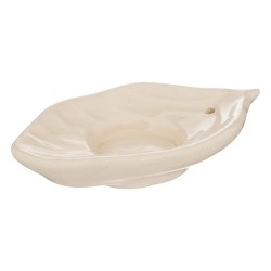 Este set incluye un portavelas de cerámica con forma de hoja, varillas de incienso y siete candelitas correspondientes a los sie
