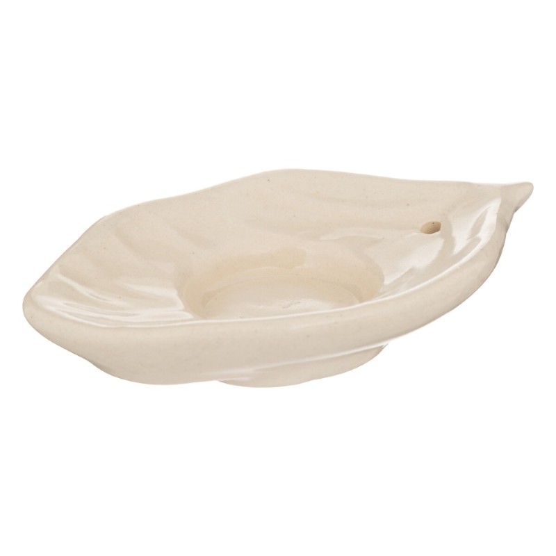 Este set incluye un portavelas de cerámica con forma de hoja, varillas de incienso y siete candelitas correspondientes a los sie