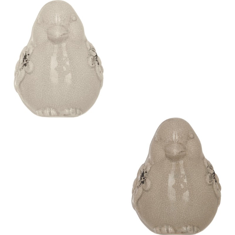 Esta figura decorativa de cerámica en forma de pajarito destaca por su textura craquelada y detalles florales en relieve. Su aca