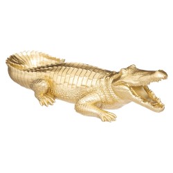Figura decorativa de cocodrilo en acabado dorado, ideal para añadir un toque étnico chic a tu espacio. Su diseño llamativo desta