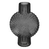 Florero elegante con diseño único, ideal para dar un toque natural y sofisticado a tu hogar. Perfecto para flores frescas o como