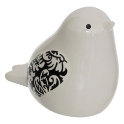 Este lote de 2 pájaros está compuesto por dos estatuillas de cerámica esmaltada, cada una con motivos florales en las alas. Con 