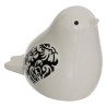 Este lote de 2 pájaros está compuesto por dos estatuillas de cerámica esmaltada, cada una con motivos florales en las alas. Con 