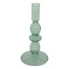 Elegante y cómodo, este portavelas de cristal tintado es el detalle perfecto para embellecer tu hogar. Su diseño delicado y su b