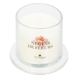 Dale un toque elegante y perfumado a tu espacio con esta sofisticada vela aromática en frasco tipo campana. Su fragancia floral 