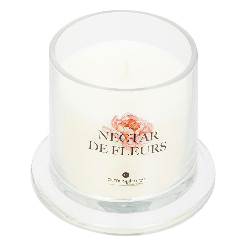 Dale un toque elegante y perfumado a tu espacio con esta sofisticada vela aromática en frasco tipo campana. Su fragancia floral 