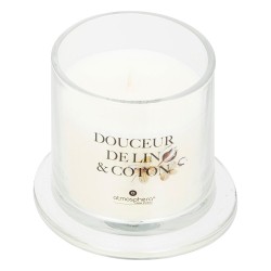 Aporta frescura y serenidad a tu hogar con esta elegante vela aromática en frasco tipo campana. Su delicado aroma a lino suave e