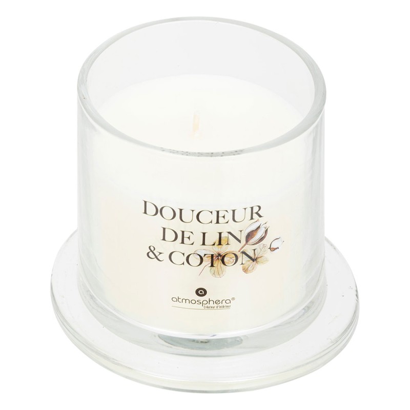 Aporta frescura y serenidad a tu hogar con esta elegante vela aromática en frasco tipo campana. Su delicado aroma a lino suave e