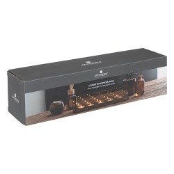 Este tarro de 5 velas "Infini" se compone de un recipiente rectangular de vidrio y metal, en el que los portavelas sostienen vel