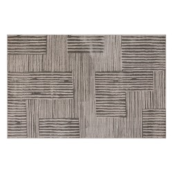 Con un diseño gráfico elegante y acabado tipo lana, el tapete decorativo Jana aporta calidez y estilo contemporáneo a tu sala. S