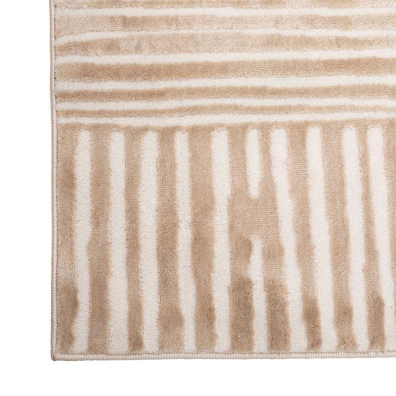 Con un diseño gráfico elegante y acabado tipo lana, el tapete decorativo Jana aporta calidez y estilo contemporáneo a tu sala. S