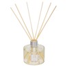 Diseñado para crear una atmósfera olfativa elegante y serena. Su botella de cristal redondeada y varillas de ratán permite regul
