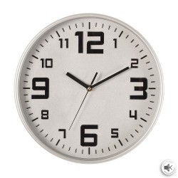 Este reloj presenta un marco que imita a la perfección el metal cepillado. Áspera y atemporal, esta estructura de 30 cm de diáme