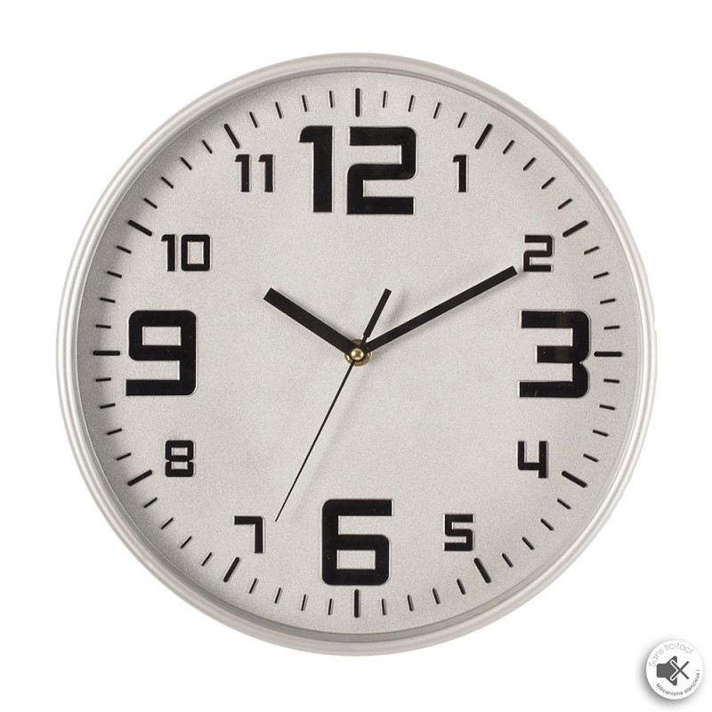 Este reloj presenta un marco que imita a la perfección el metal cepillado. Áspera y atemporal, esta estructura de 30 cm de diáme