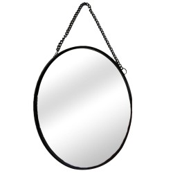 Los espejos redondos individuales pueden trabajar juntos en un patrón así como individualmente, creando una decoración reflectan