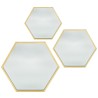 Los espejos hexagonales individuales pueden trabajar juntos en un patrón así como individualmente, creando una decoración reflec