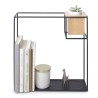 El estante flotante Cubist de Umbra es una pieza funcional y decorativa que añade un toque moderno a cualquier espacio. Con un c