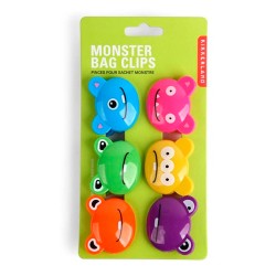 Juego de pinzas plásticas para cerrar bolsas. Cada pinza tiene pintada la divertida cara de un monstruo. Cada uno tiene una dist