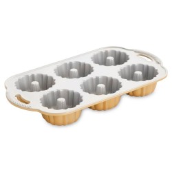 Este adorable molde bundt nordic ware en miniatura de excelente calidad es el sueño de un fabricante de postres, crea magníficas