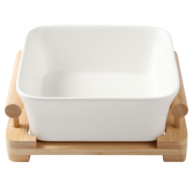 Sirve tus ensaladas favoritas con esta elegante ensaladera de diseño cuadrado, acompañada de una base blanca que realza su prese